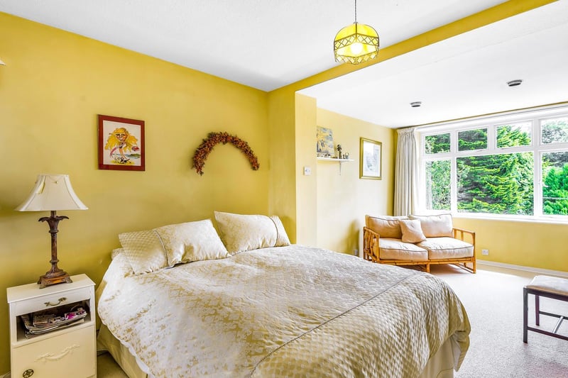 A great deal of space for a vafiety of uses within this sunny bedroom