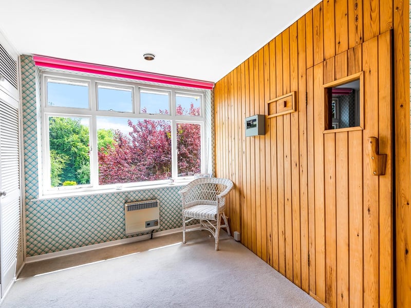 The sauna on the first floor of the house is accessed via the master bedroom
