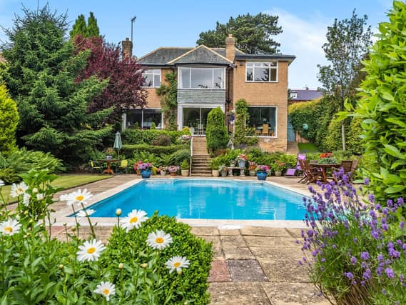 A glorious setting for this house and swimming pool in Scalby