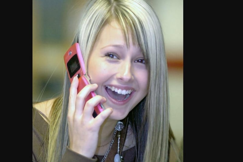 A delighted Samantha Bryan phones her parents with the results in 2007.