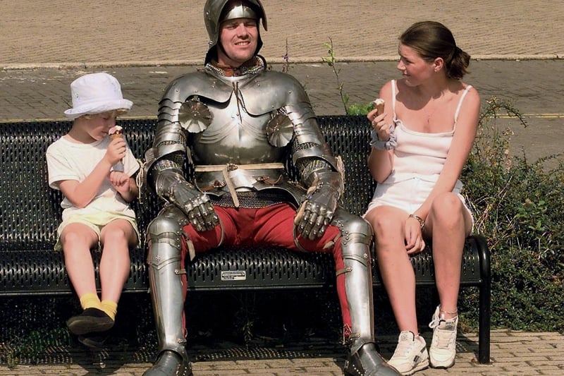 Andy Deane from the Royal Armouries melts in the ice cream heat wearing more than 80lbs of armour. He was involved in daily displays of jousting and knights in Armour fights for visitors.