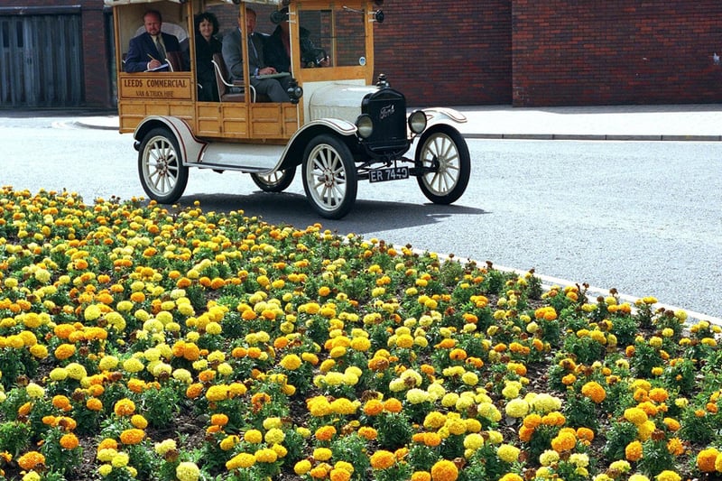 Judges from the Britain in Bloom competition go around Leeds in a vintage Model T Ford.