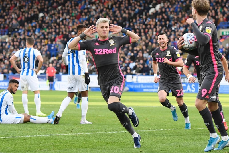 Ezgjan Alioski celebrates after scoring Leeds United's first goal during the Championship clash against Huddersfield Town at the John Smith's Stadium in December 2019.