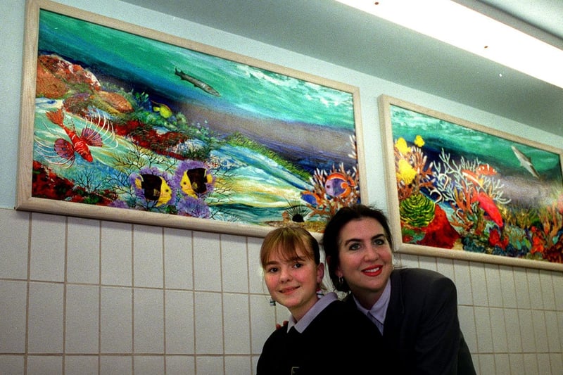 Artist Amy Preater and out-patient Samantha Hellewell with part of the coral reef mural in the Hydrotherapy Unit at Leeds General Infirmary.