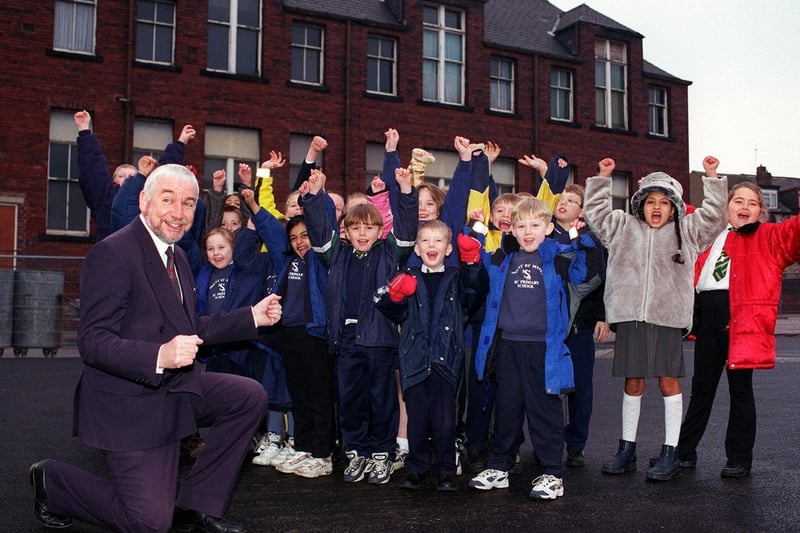 Mount St Mary's Primary in East End Park was awarded £40,000 to rebuild the school. Headteacher Martin Flannery is pictured celebrating the news with pupils.