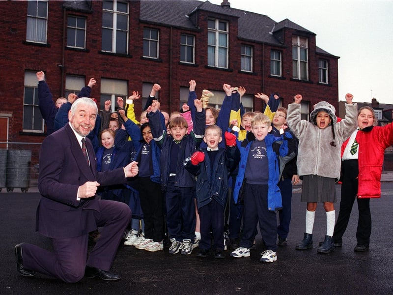 Mount St Mary's Primary in East End Park was awarded £40,000 to rebuild the school. Headteacher Martin Flannery is pictured celebrating the news with pupils.