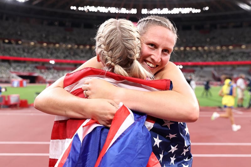 Holly Bradshaw hugs Katie Nageotte of Team USA after the Olympic bronze medal success