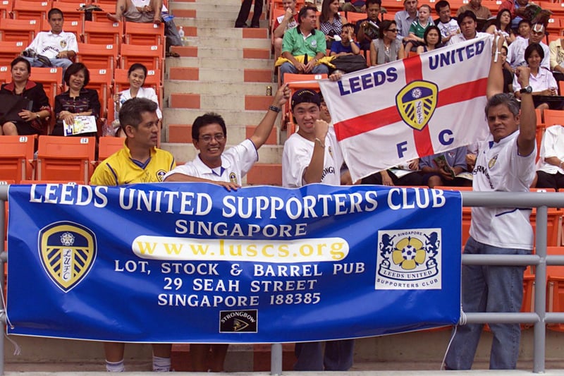 The Leeds United Supporters Club of Singapore show their support before kick off.