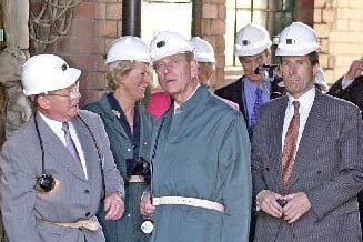 The royal visit of HRH The Duke of Edinburgh at National Coal Mining Museum near Wakefield. July 2002.The Duke in miner's helmet and lamp, centtre, is pictured ready to go down the mine shaft.