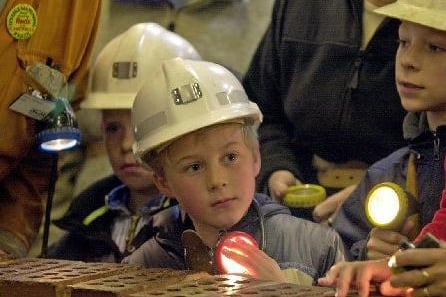 Visitors preparing to go underground at the National Coal Mining Museum