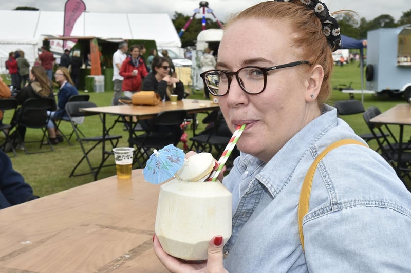 Kat Stinson, of Roundhay, with a coconut from The Coco Shack. Young coconuts with coconut water, rum and flavouring.