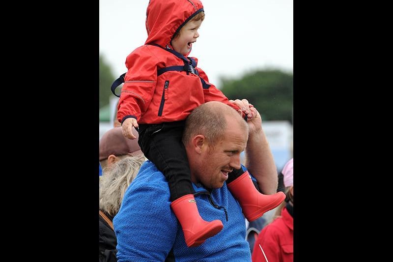 The annual Garstang Agricultural Show, Garstang. Having fun on dads shoulders. Picture by Paul Heyes, Saturday July 07, 2021.