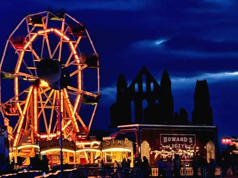 A big wheel lights up the night sky in Whitby.