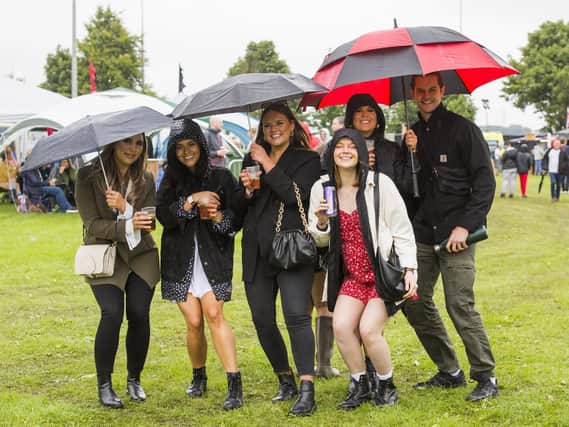 With brollies at the ready at Brodstock are, from the left, Olivia Wright, Megan Appleyard, Lucy Appleyard, Megan Ackroyd, Jade Grimsdale and Max Woodbridge.