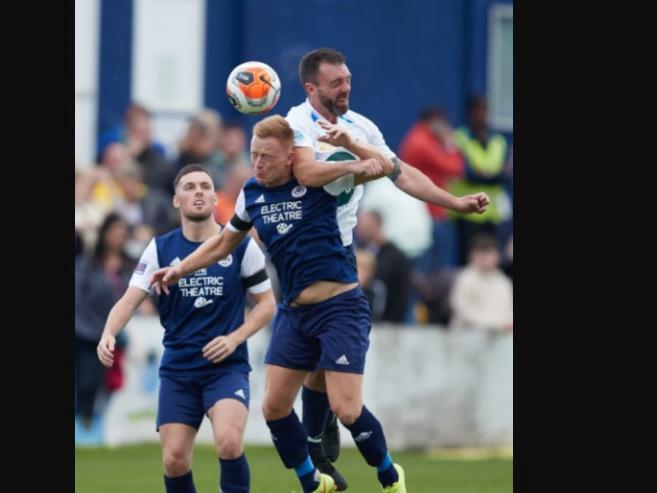 Kews and Rory's Rovers battle it out for control of the ball.