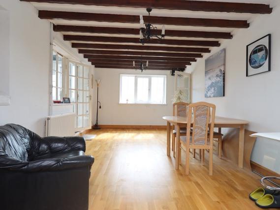 Beams add character to this sizeable room
