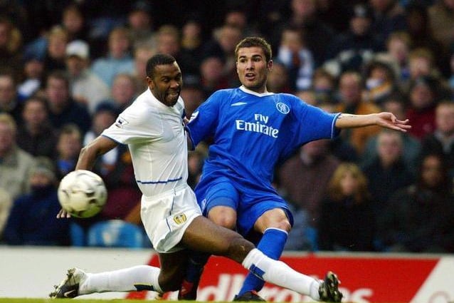 Lucas Radebe duels with Chelsea's Adrian Mutu at Elland Road during Leeds United's season in the Premier League in 2003-04. Photo by STEVE PARKIN/AFP via Getty Images.