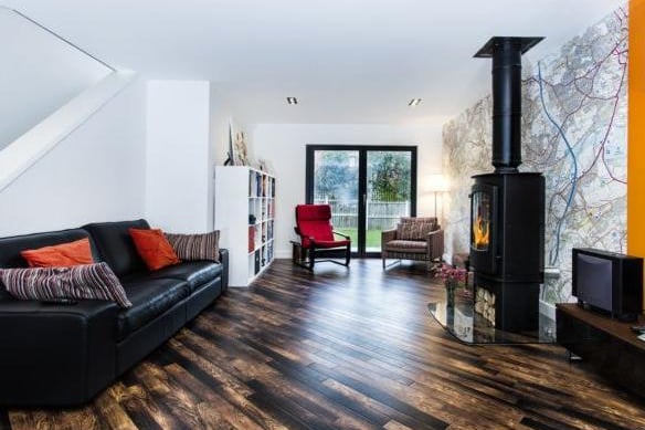 The chic space also has Karndean flooring with underfloor heating, spotlights to ceiling as well as two wall lights and a feature multi fuel stove.