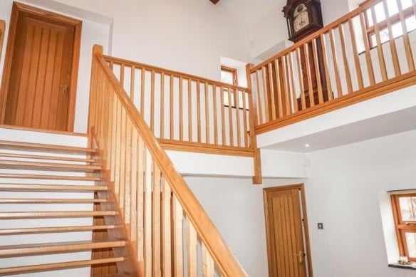 A stunning feature of the house is the galleried landing with feature beams.