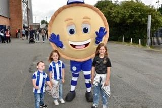 These young fans with Latics' mascot