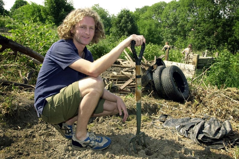 Pictured is Mark Stainton, chairman of the Bandstand Community Gardens on Woodhouse Ridge, in Meanwood. The group was tidying the derelict allotments on the site for local residents to grow organic produce back in July 2001. Picture: Tony Johnson