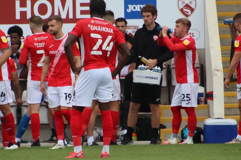 Morecambe's players take the chance for some refreshments