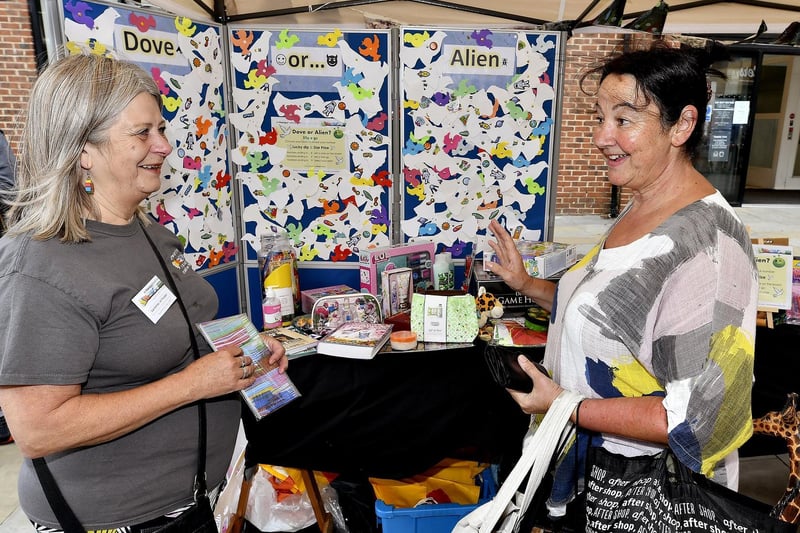 Chatting at the art therapy stall.