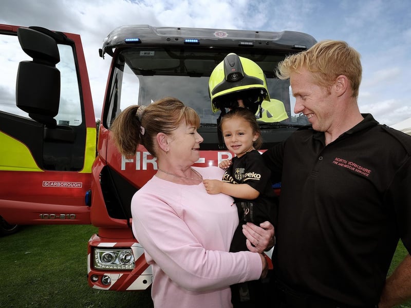 Grandma Susan Sadler with Hudson Hawks and Firefighter Lalan Lynn.