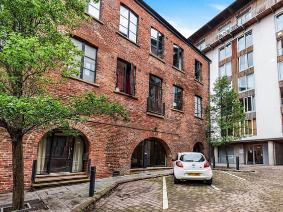 Take a look inside this apartment inside a former cotton mill.