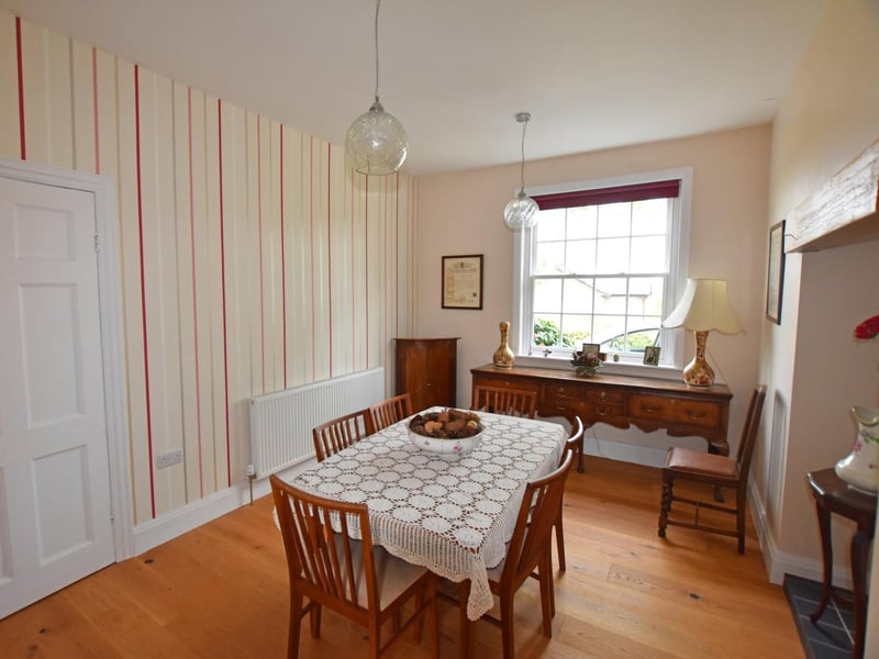 The elegant formal dining room within the house.