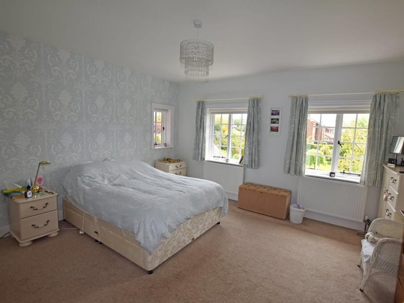 One of the four bedrooms on the first floor.