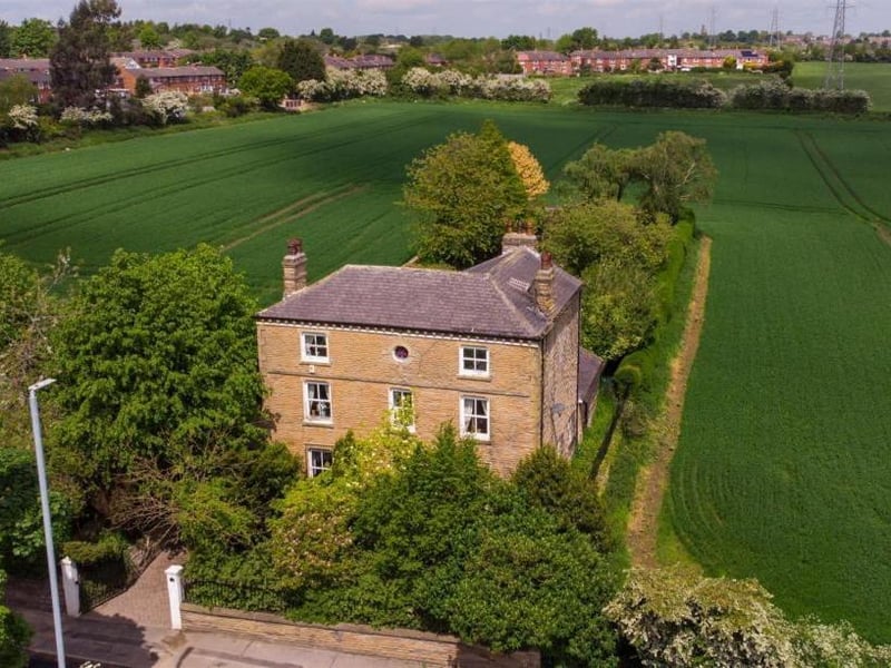 This six bedroom property in Leadwell Lane dates back to the Victorian era between 1837–1901. Sat in grounds of approximately half an acre, this extremely spacious property offers retains its characterful period features while being respectfully updates to add some contemporary finishing touches. The plot enjoys a private position with views over open fields in all directions, and is accessed via a gated private drive leading to the forecourt with the detached double garage. The original coach house features exposed timber beams, mezzanine level, to the side, fitted cupboards, car pit and two windows to the rear aspect. It offers plenty for future development. It is on the market for £925,000 with Emsleys.