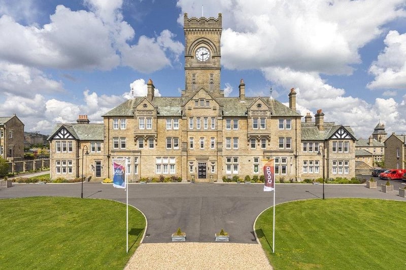 This exquisite penthouse apartment in Menston is set within the grandeur of a Victorian Clock Tower which formed part of the original hospital buildings. The homes within this historic building have been painstakingly transformed during the restoration process but still maintain many unique and original features such as the tall windows and high corniced ceilings. The apartment itself is set over two floors and has been modernised by the current owner to include handmade handmade with bespoke island units, Siemens appliances, and a living living feature TV wall with bespoke Dekton wall hanging unit with integrated Sky box, Sonos sound bar and TV. The property is set within grounds of approximately 200 acres of park and woodland. It is on the market with Dacre, Son & Hartley for £499,950.