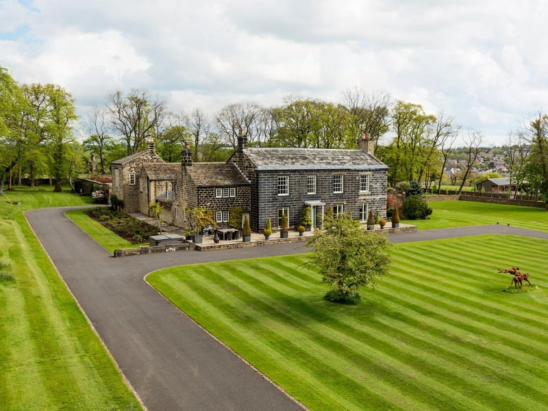 Beech House, in Horsforth, is a grand mansion, described as one of the finest Georgian Houses in the area. The Grade II listed country house, in Scotland Lane, is a very spacious family home, which sits in its own private grounds. It dates back to 1750, with a number of additions in the 1800s. Estate agent Savills says it now boasts boasts a unique combination of period charm alongside modern technology and interior design. As well as eight bedrooms, six bathrooms and three reception rooms, the property also boasts a beautiful Georgian staircase and ornate plasterwork, an arched wine cellar, and an adjoining annex with cinema room, sitting room, games room and separate living area. It is on the market with Savills for £3.500,000.