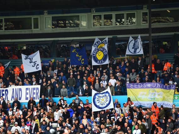 Leeds United fans with retro banners at Elland Road.
