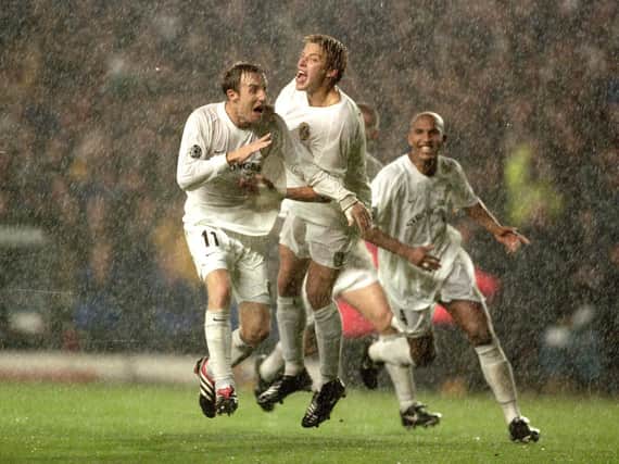 Leeds United midfielder celebrations scoring a late winner against AC Milan in 2000.