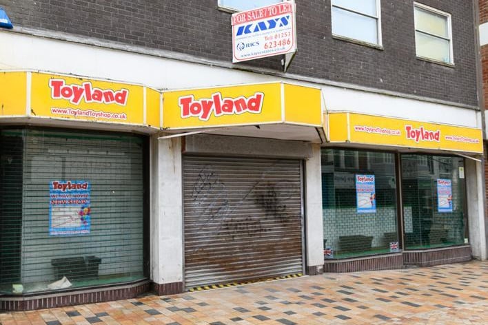 Next door is Toyland which has since moved to Church Street. It is for sale or let with Kays.