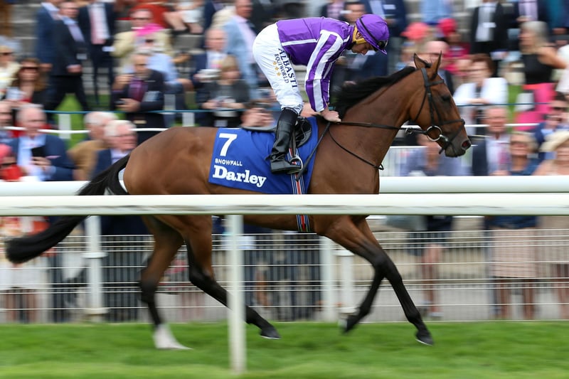 Snowfall and Ryan Moore parade on the Knavesmire after winning the Darley Yorkshire Oaks.