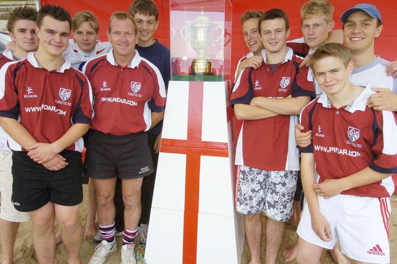 Members of the Scarborough RUFC Colts pictured with the Rugby World Cup.