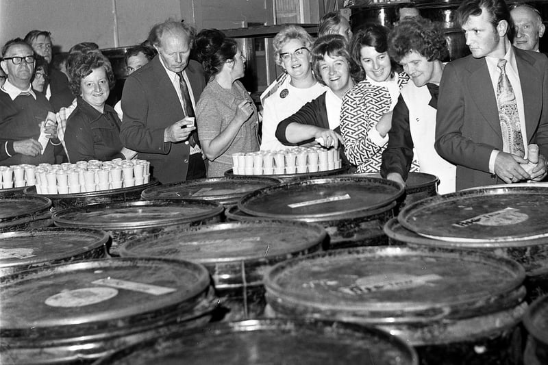 RETRO - 1973 A group of visitors are shown around the Tupperware factory in Beech Hill Wigan, during 1973.