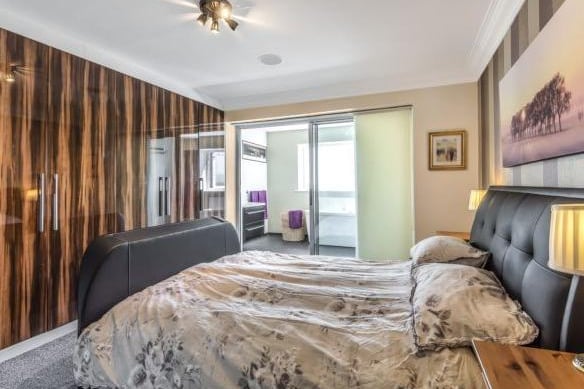 Upstairs are four generous double bedrooms. The master bedroom has a large three piece luxury en-suite bathroom with a picture window with fantastic views.