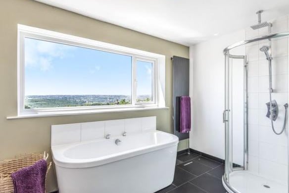 The family bathroom is a modern, luxury house shower room.
