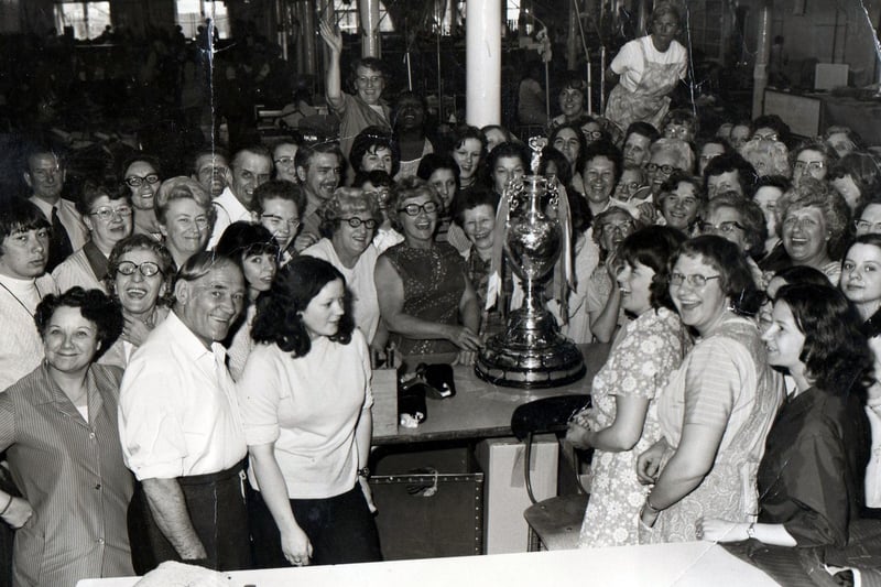Hepworths Ltd staff with the 1974 football league trophy