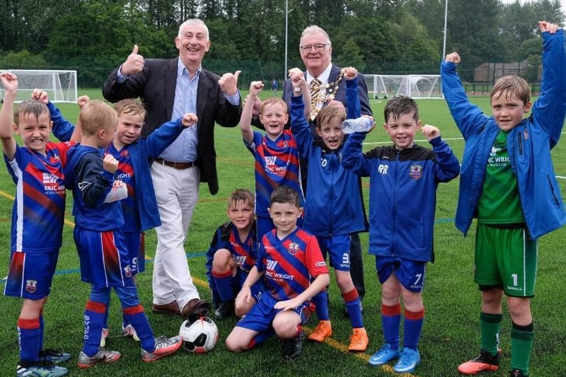 Sir Lindsay Hoyle MP and Mayor of Chorley Councillor Steve Holgate with some of the young footballers making use of the new facilities
