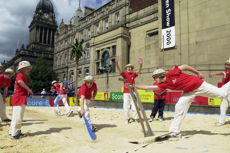 Batsman Daniel Rhodes struggles to get back into his crease as wicket keeper Kathryn Doherty knocks the bails for six on the Channel 4 Community Beach at Victoria Gardens.