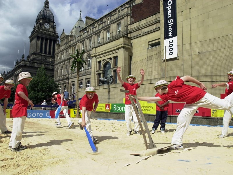 Batsman Daniel Rhodes struggles to get back into his crease as wicket keeper Kathryn Doherty knocks the bails for six on the Channel 4 Community Beach at Victoria Gardens.