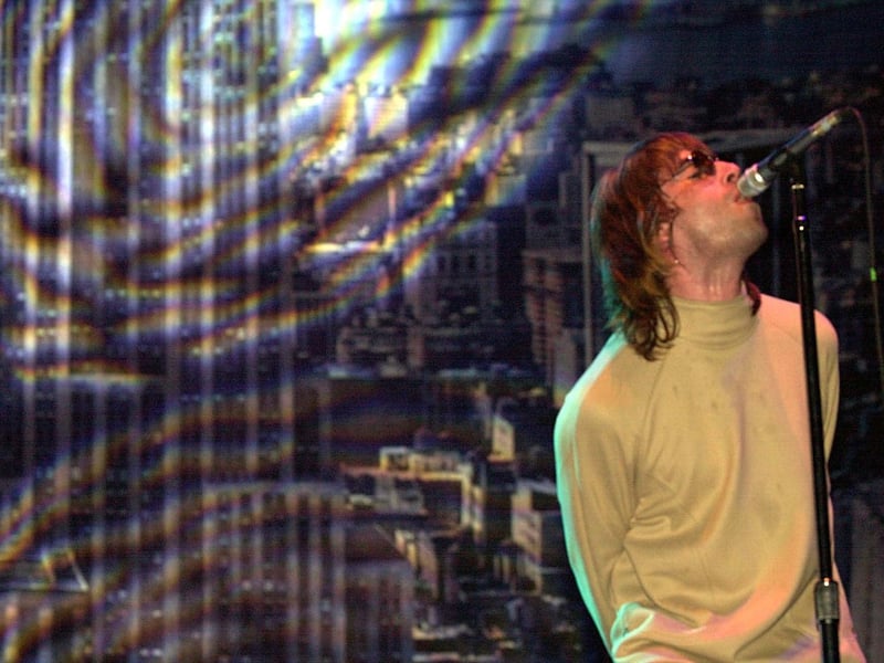 Liam Gallagher of Oasis on stage during day three of Leeds Festival.