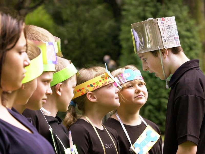 Local children from Armley took part in the Leeds Drama Workshops project to discuss their visions of the city in 500 years. Pictured is Liam Owen, the Bossman of the 'Computer Heads' checking on his staff.