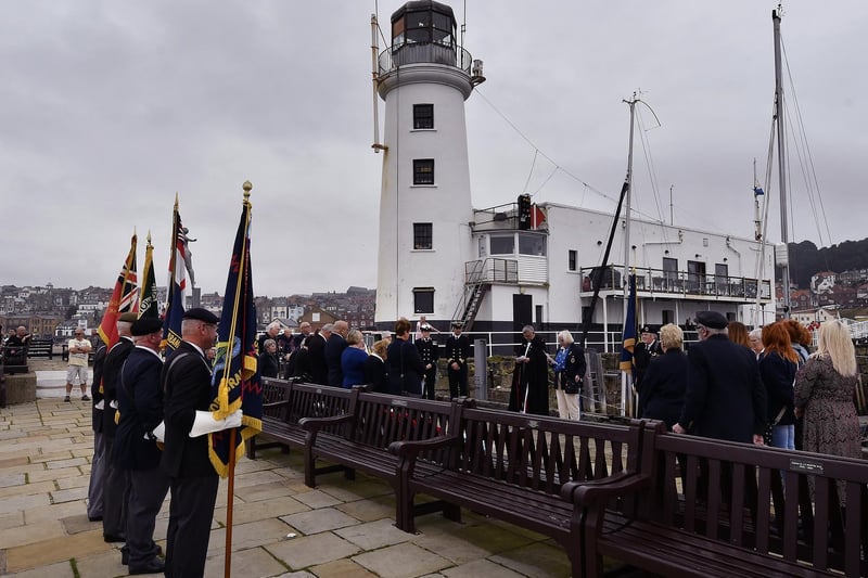 The memorial service takes place on the pier.