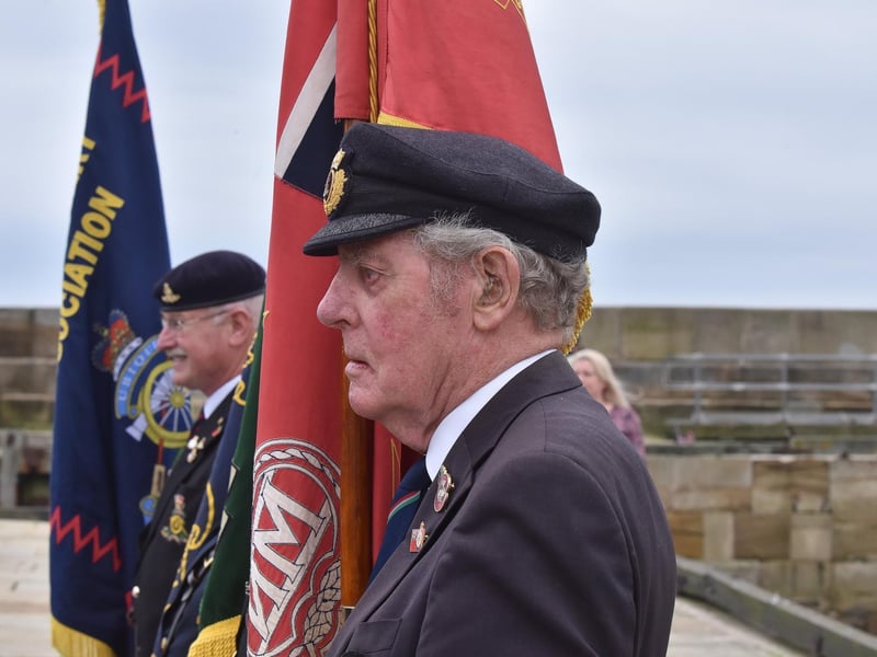 Standard bearers on the pier.